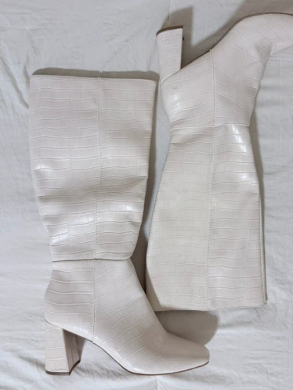 White knee high boots